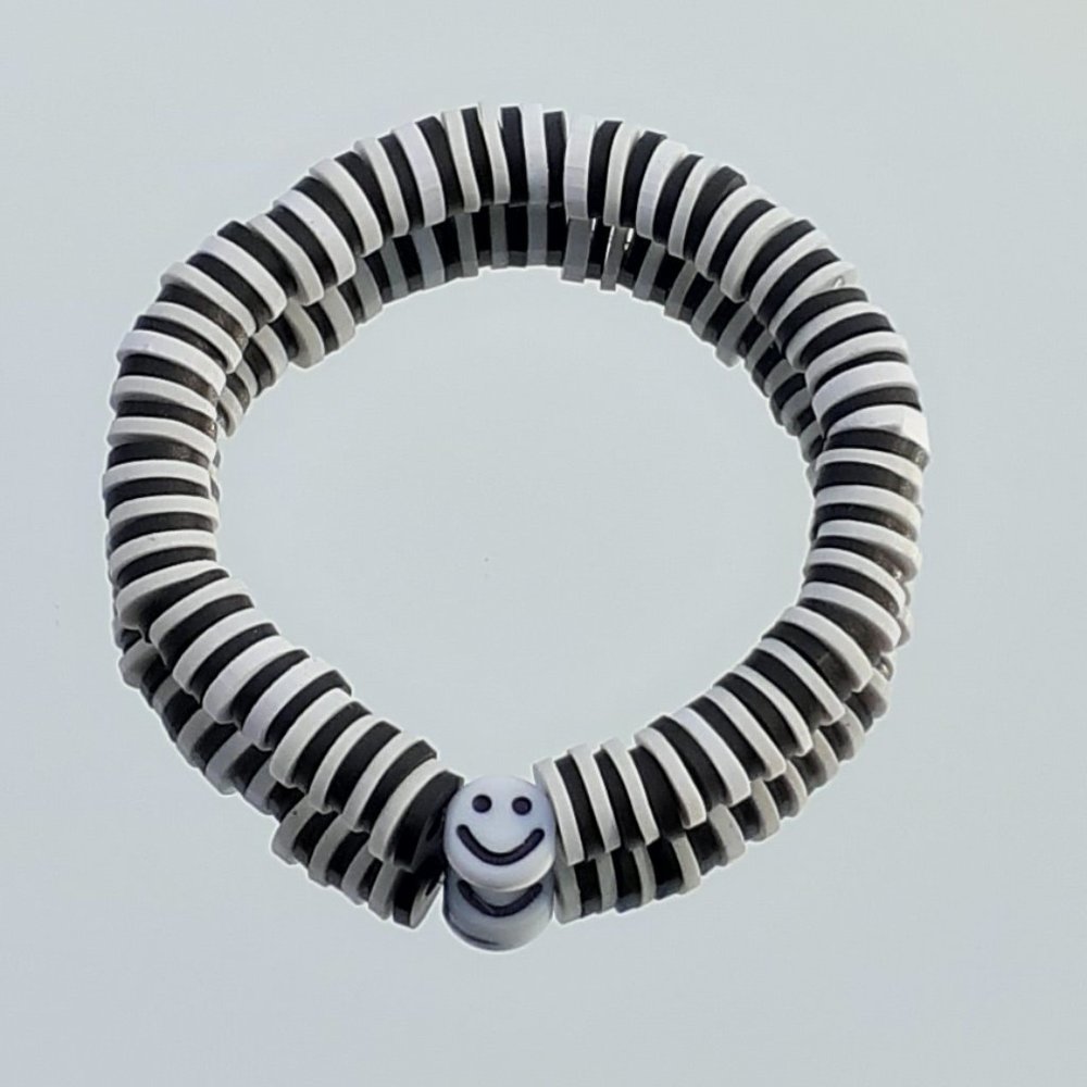 Clay beads stretchy string bracelet when you buy 2 you get 1 free bracelet!